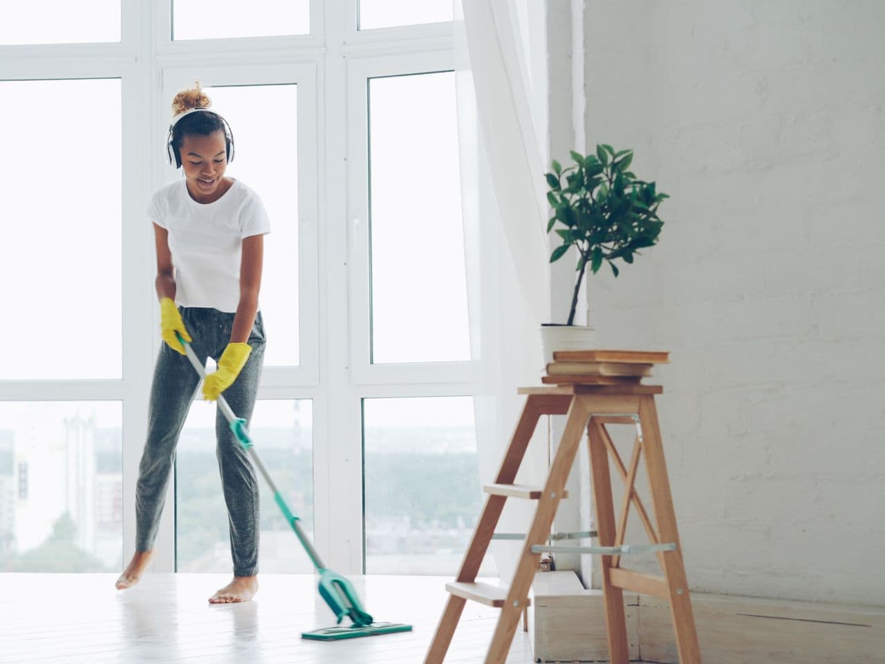 Bright loft apartment getting a fresh mop under morning sun